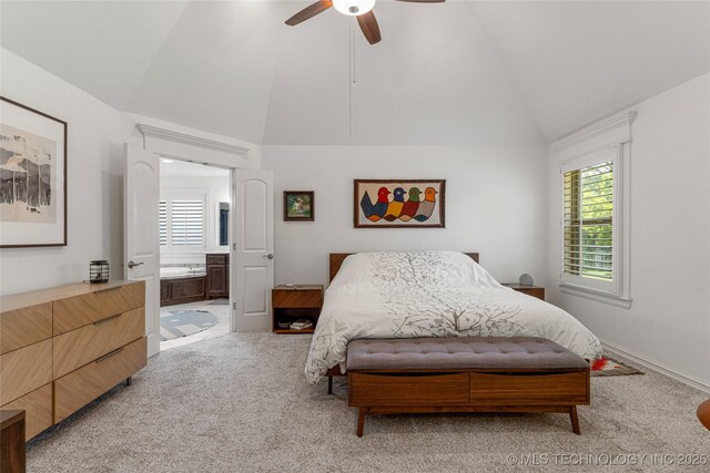 2835 E 104th St, Tulsa, OK 74137 - bedroom featuring light colored carpet, high vaulted ceiling, ceiling fan, and ensuite bath