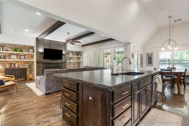 2835 E 104th St, Tulsa, OK 74137 - kitchen featuring a sink, dark wood-type flooring, a ceiling fan, dishwasher, and dark brown cabinets