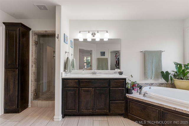 2835 E 104th St, Tulsa, OK 74137 - full bath with a shower stall, a garden tub, and vanity