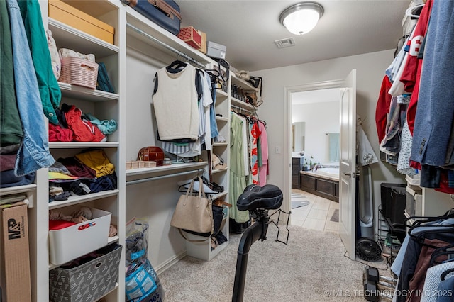 2835 E 104th St, Tulsa, OK 74137 - walk in closet with carpet floors