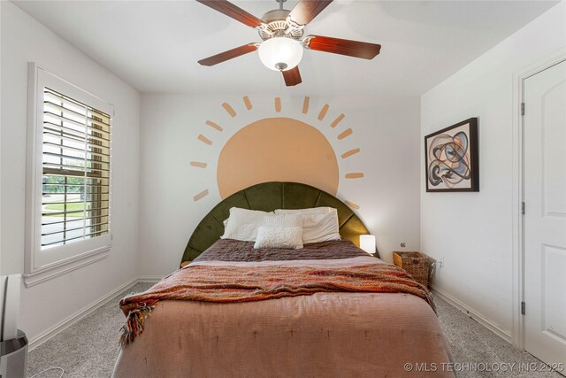 2835 E 104th St, Tulsa, OK 74137 - bedroom with carpet flooring, baseboards, and a ceiling fan