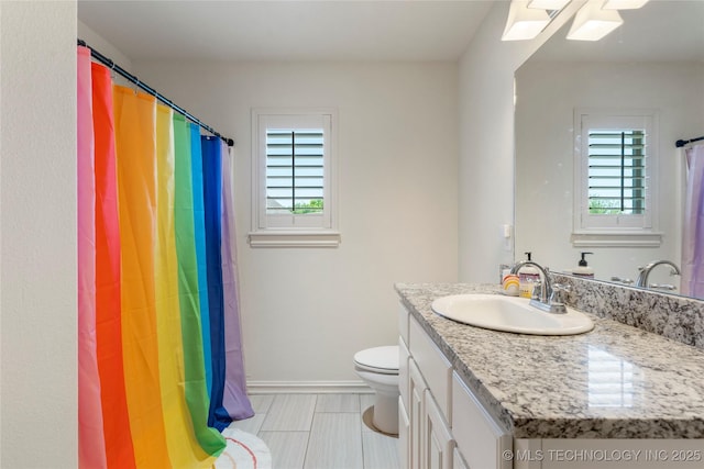 2835 E 104th St, Tulsa, OK 74137 - bathroom with toilet, vanity, baseboards, and curtained shower