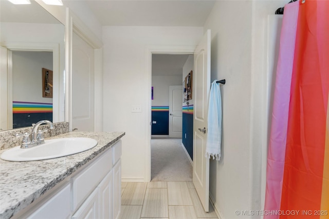 2835 E 104th St, Tulsa, OK 74137 - bathroom with vanity and baseboards