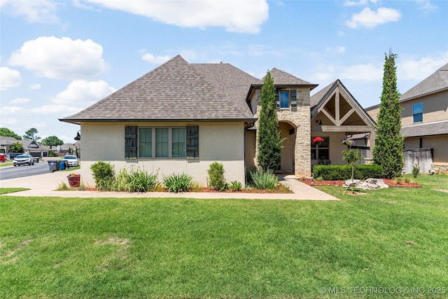 2835 E 104th St, Tulsa, OK 74137 - view of front facade with stucco siding, roof with shingles, a front yard, and stone siding