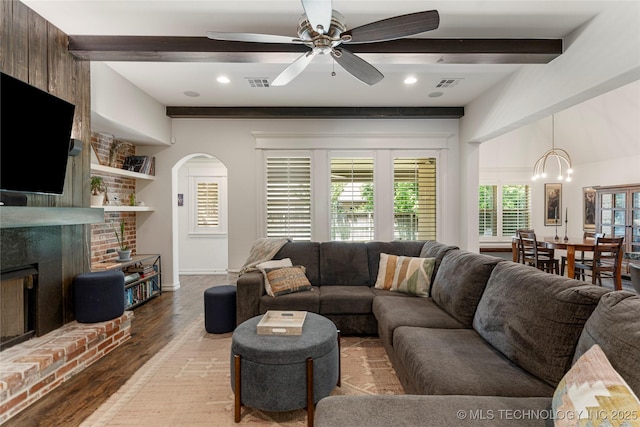 2835 E 104th St, Tulsa, OK 74137 - living room featuring a fireplace, beamed ceiling, light wood finished floors, ceiling fan, and recessed lighting