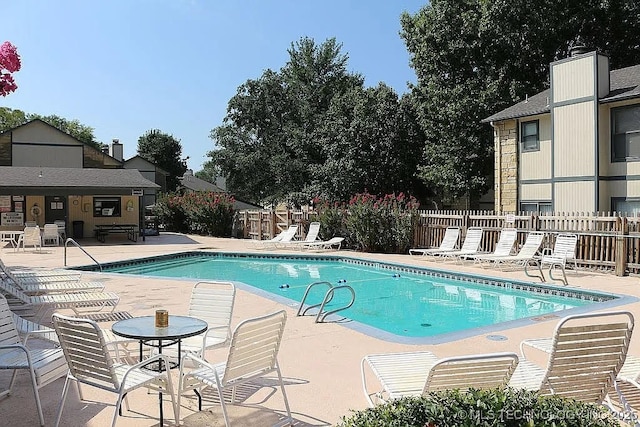 5281 Nowata Rd Unit Q101, Bartlesville, OK 74006 - community pool featuring a patio