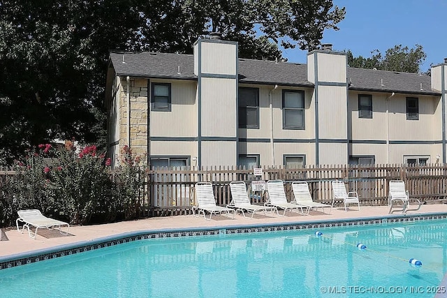 5281 Nowata Rd Unit Q101, Bartlesville, OK 74006 - community pool with a patio area