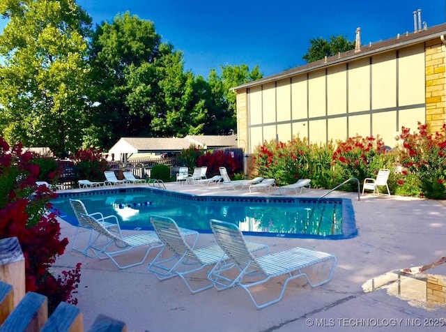 5281 Nowata Rd Unit Q101, Bartlesville, OK 74006 - view of pool with a patio