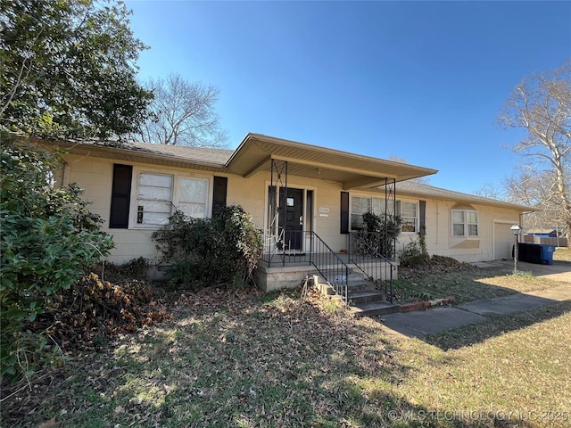 1506 E 46th Pl, Tulsa, OK 74105 - view of front of home featuring a garage