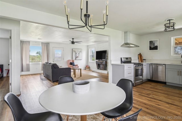 435781 E 130th Rd, Welch, OK 74369 - dining room with a chandelier, dark wood-style floors, and baseboards