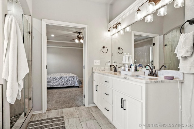 2661 S Catalayah Ln, Claremore, OK 74019 - bathroom featuring ceiling fan, double vanity, ornamental molding, a stall shower, and baseboards