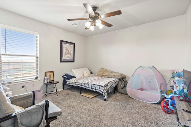 2661 S Catalayah Ln, Claremore, OK 74019 - bedroom featuring carpet and a ceiling fan