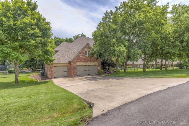 7333 S 286th E Ave, Broken Arrow, OK 74014 - view of front of house with brick siding, a garage, concrete driveway, and roof with shingles