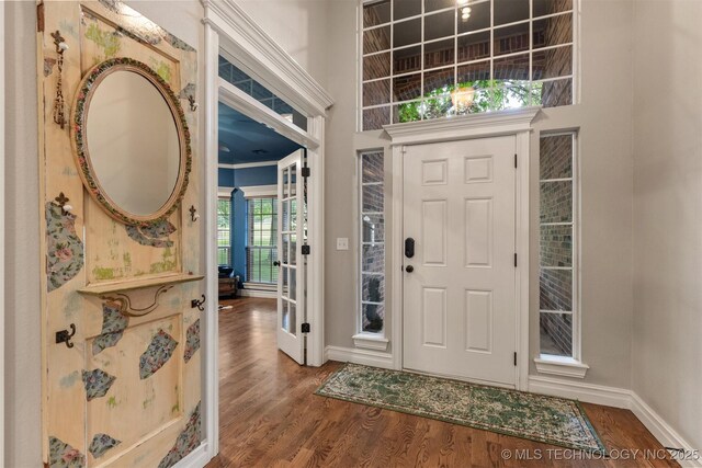 7333 S 286th E Ave, Broken Arrow, OK 74014 - entryway featuring baseboards, wood finished floors, and ornamental molding