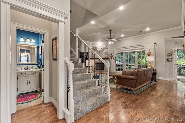 7333 S 286th E Ave, Broken Arrow, OK 74014 - stairway with ceiling fan, crown molding, recessed lighting, wood finished floors, and baseboards