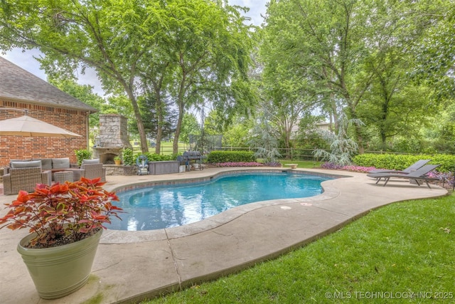 7333 S 286th E Ave, Broken Arrow, OK 74014 - swimming pool featuring an outdoor stone fireplace, a patio area, and fence
