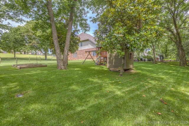 7333 S 286th E Ave, Broken Arrow, OK 74014 - view of grassy yard with a playground