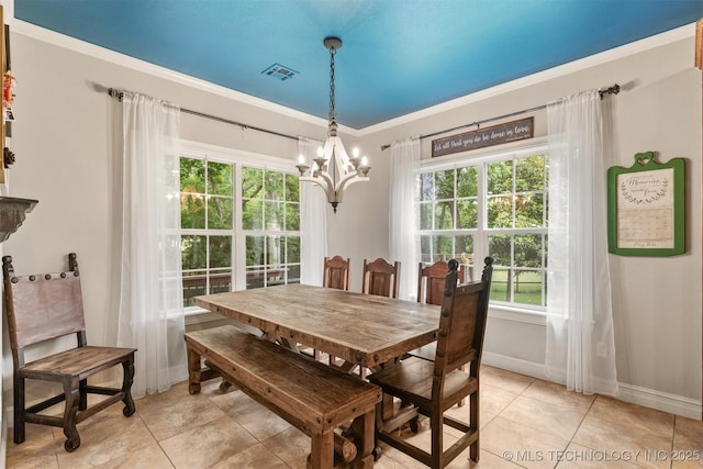 7333 S 286th E Ave, Broken Arrow, OK 74014 - dining area featuring a chandelier, baseboards, and light tile patterned flooring