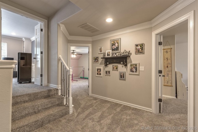 7333 S 286th E Ave, Broken Arrow, OK 74014 - hall with carpet, ornamental molding, an upstairs landing, baseboards, and recessed lighting