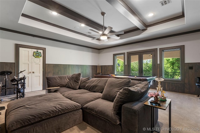 6830 E 109th St, Tulsa, OK 74133 - carpeted living room with wainscoting, billiards table, wooden walls, ceiling fan, and a tray ceiling