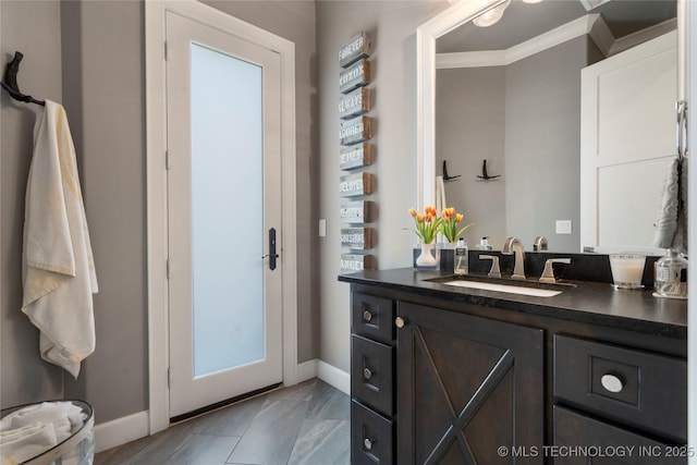 6830 E 109th St, Tulsa, OK 74133 - bathroom featuring ornamental molding, baseboards, and vanity
