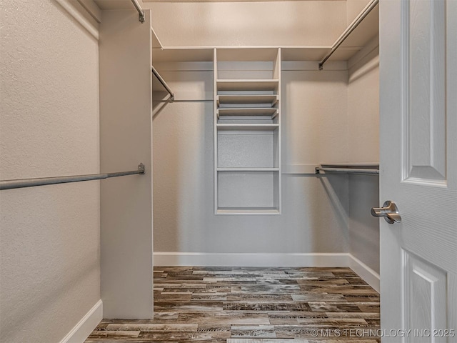 15412 E 78th St N, Owasso, OK 74055 - spacious closet featuring wood finished floors