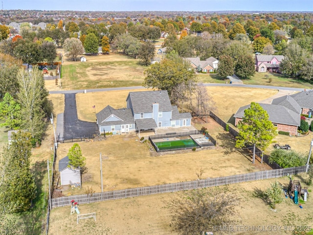 15412 E 78th St N, Owasso, OK 74055 - aerial perspective of suburban area with a tree filled landscape
