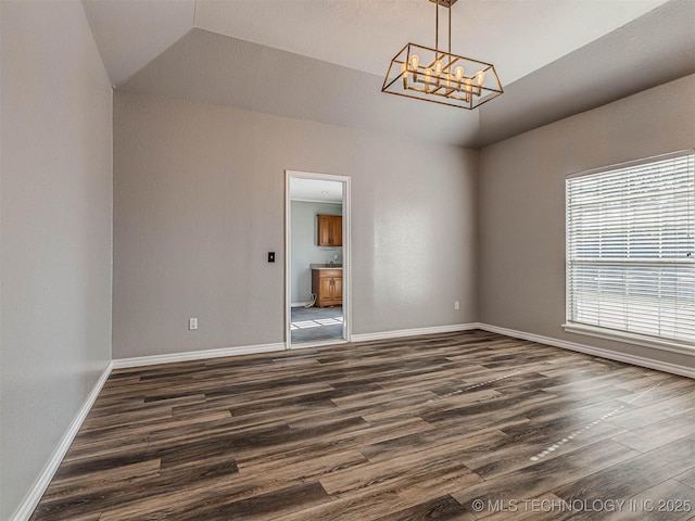 15412 E 78th St N, Owasso, OK 74055 - unfurnished room with a chandelier, dark wood-style floors, lofted ceiling, and baseboards