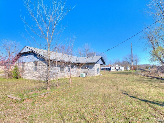 205 Lester Ln, Cleveland, OK 74020 - view of green lawn featuring cooling unit