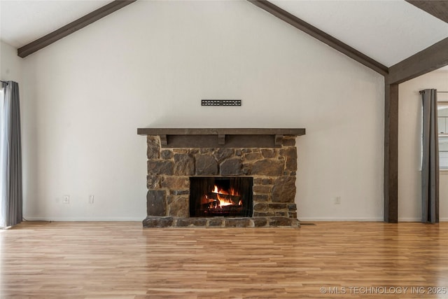3901 E 60th Pl, Tulsa, OK 74135 - unfurnished living room featuring wood finished floors, beam ceiling, a fireplace, baseboards, and high vaulted ceiling