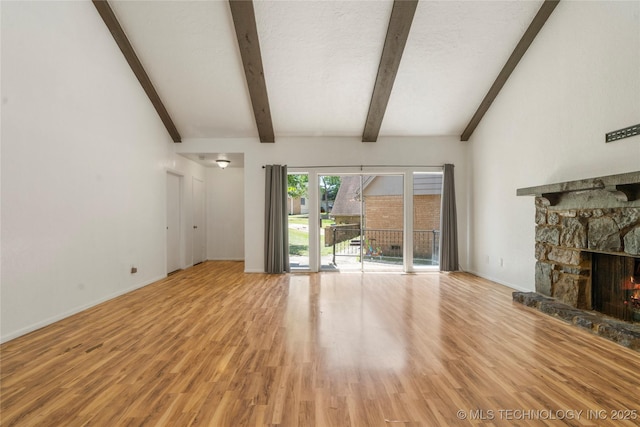 3901 E 60th Pl, Tulsa, OK 74135 - unfurnished living room featuring a fireplace, light wood-style floors, and baseboards