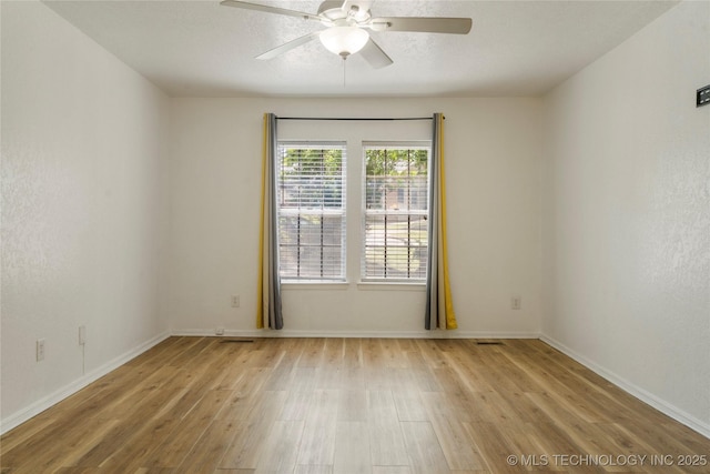 3901 E 60th Pl, Tulsa, OK 74135 - empty room featuring light wood-type flooring, a ceiling fan, and baseboards