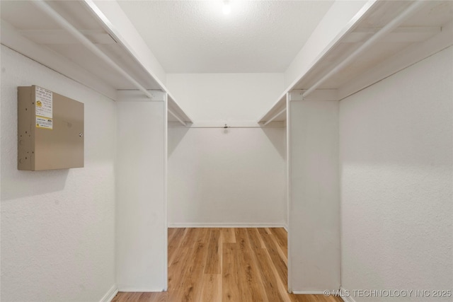 3901 E 60th Pl, Tulsa, OK 74135 - spacious closet with wood finished floors