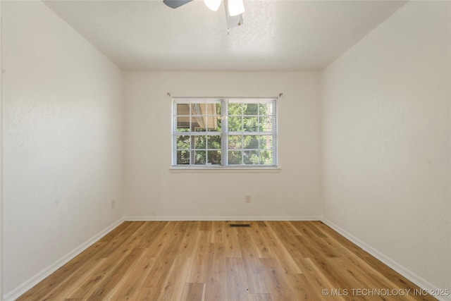 3901 E 60th Pl, Tulsa, OK 74135 - spare room featuring light wood-style flooring, baseboards, and ceiling fan