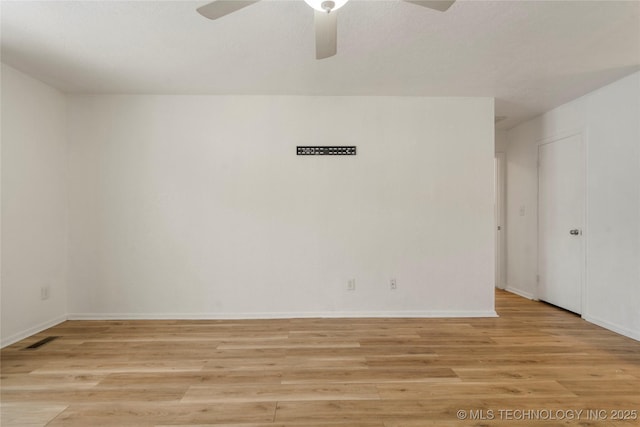 3901 E 60th Pl, Tulsa, OK 74135 - spare room featuring light wood-type flooring, ceiling fan, and baseboards