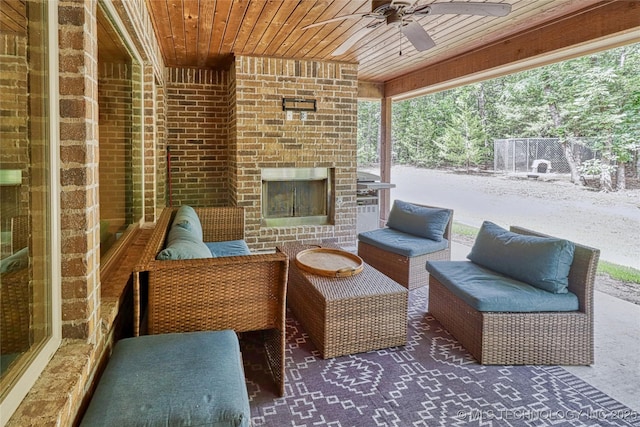 117683 Powell Rd, Eufaula, OK 74432 - view of patio featuring ceiling fan and an outdoor living space with a fireplace