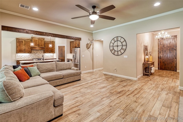 117683 Powell Rd, Eufaula, OK 74432 - living room featuring light wood-style floors, a ceiling fan, recessed lighting, crown molding, and baseboards