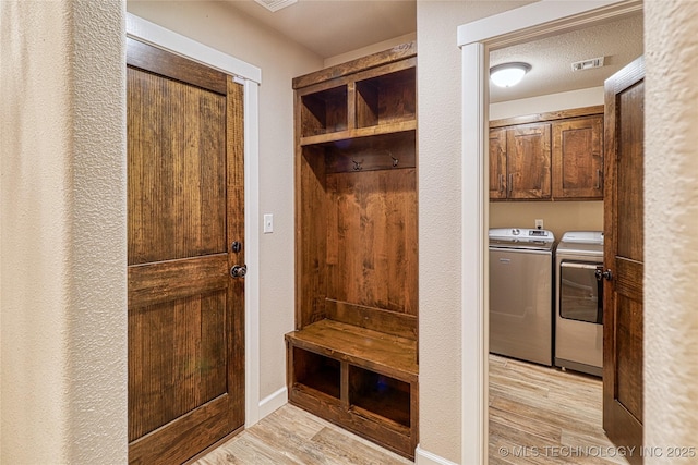 117683 Powell Rd, Eufaula, OK 74432 - mudroom with light wood-style flooring and washer and dryer