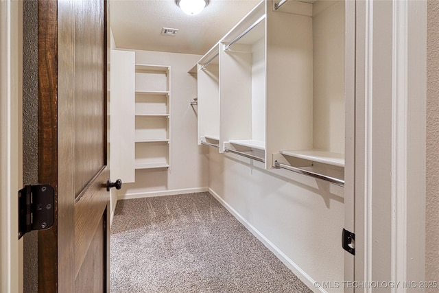 117683 Powell Rd, Eufaula, OK 74432 - walk in closet featuring carpet flooring