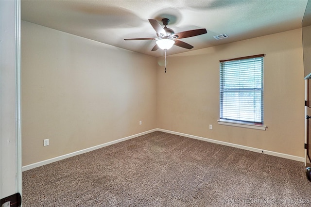 117683 Powell Rd, Eufaula, OK 74432 - unfurnished room featuring ceiling fan, dark carpet, and baseboards