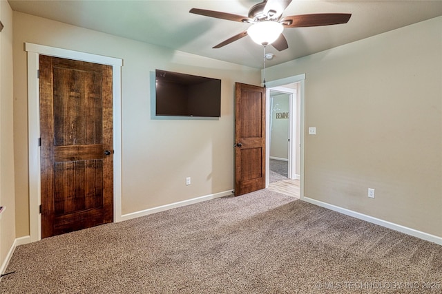 117683 Powell Rd, Eufaula, OK 74432 - unfurnished bedroom featuring carpet flooring, baseboards, and a ceiling fan