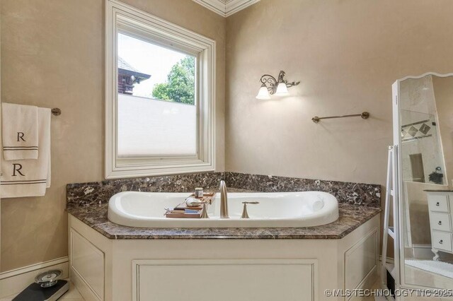 716 W 108th Pl S, Jenks, OK 74037 - full bathroom featuring a garden tub and a sink