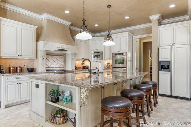 716 W 108th Pl S, Jenks, OK 74037 - kitchen with paneled refrigerator, open shelves, a sink, crown molding, and stainless steel double oven
