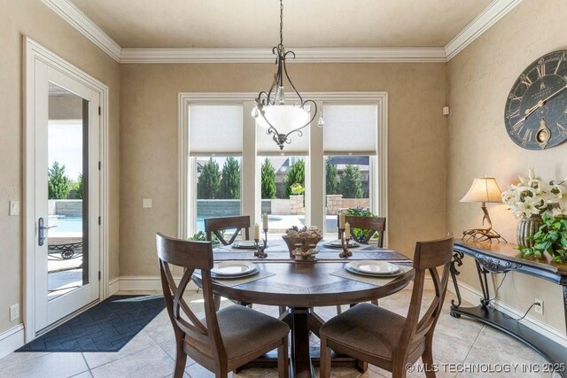 716 W 108th Pl S, Jenks, OK 74037 - dining space featuring crown molding, baseboards, and light tile patterned floors