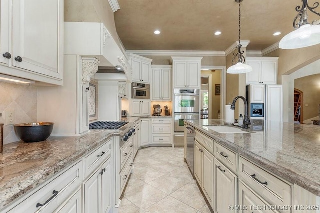 716 W 108th Pl S, Jenks, OK 74037 - kitchen featuring a sink, stainless steel appliances, tasteful backsplash, crown molding, and decorative light fixtures
