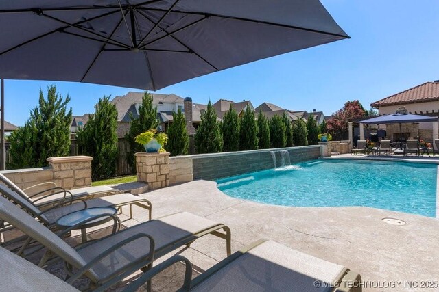 716 W 108th Pl S, Jenks, OK 74037 - view of swimming pool featuring a patio and fence