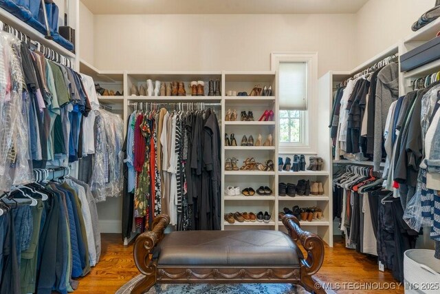 716 W 108th Pl S, Jenks, OK 74037 - walk in closet with wood finished floors