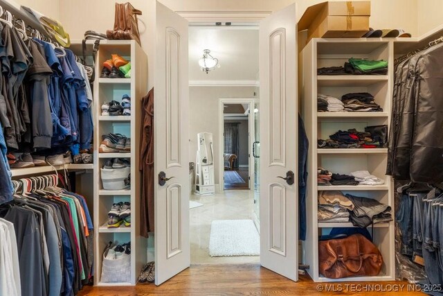 716 W 108th Pl S, Jenks, OK 74037 - spacious closet featuring wood finished floors