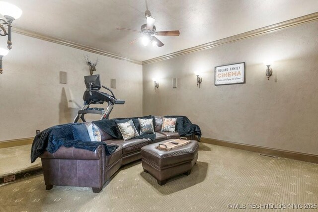 716 W 108th Pl S, Jenks, OK 74037 - living room with ceiling fan, carpet floors, crown molding, and baseboards