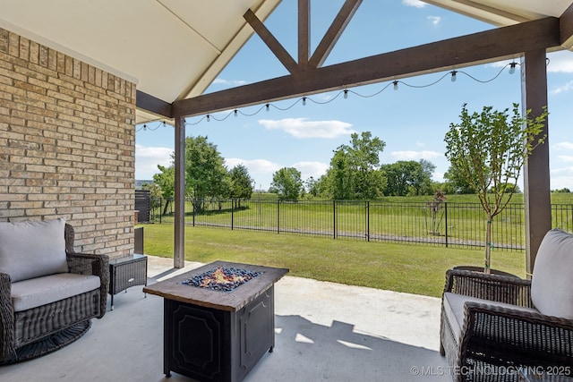 view of patio with an outdoor fire pit